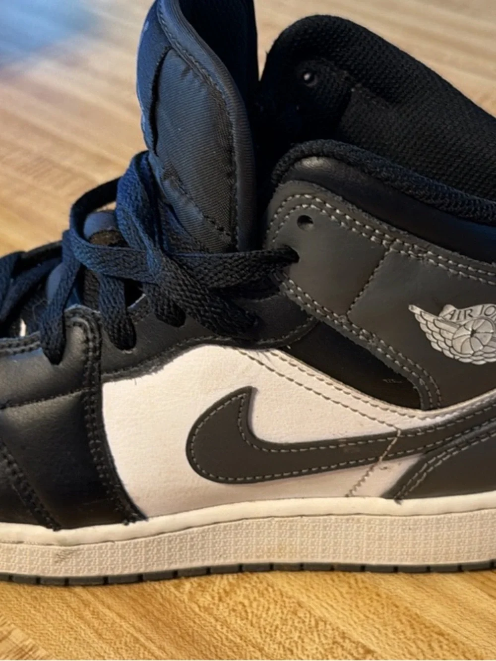 Jordan Kids Black and White High-Top Sneakers
